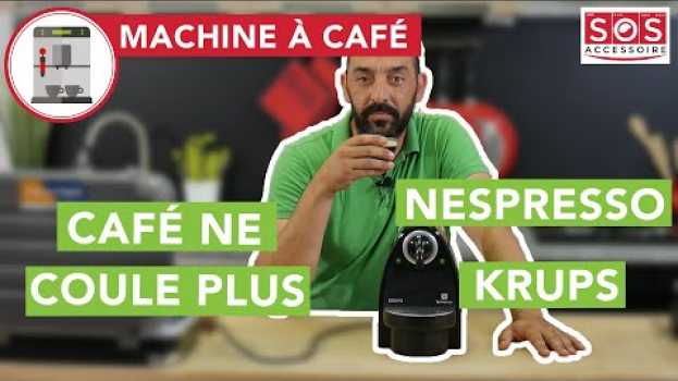 Video Nespresso Krups : le café ne coule plus / coule mal : comment changer l'unité de brassage ? em Portuguese