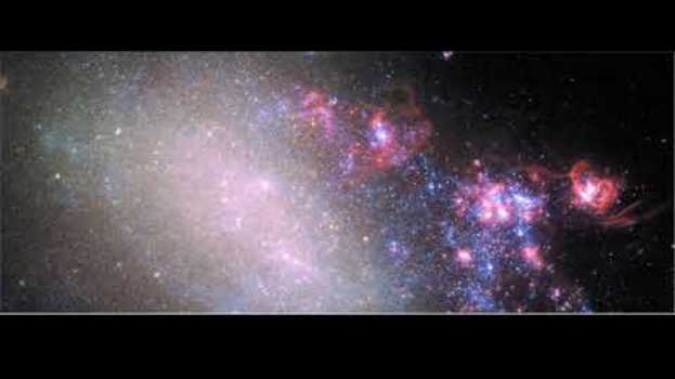 Video Uma colisão cósmica em ação.  O que pode acontecer quando uma galáxia atinge outra lateralmente? in English