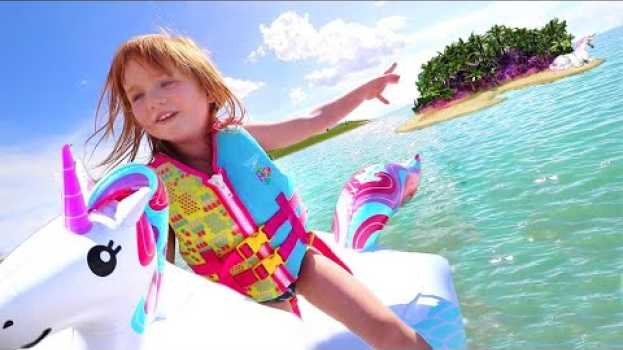 Видео welcome to UNiCORN iSLAND!! a Family Day at the Beach! first time swimming across the lake with kids на русском