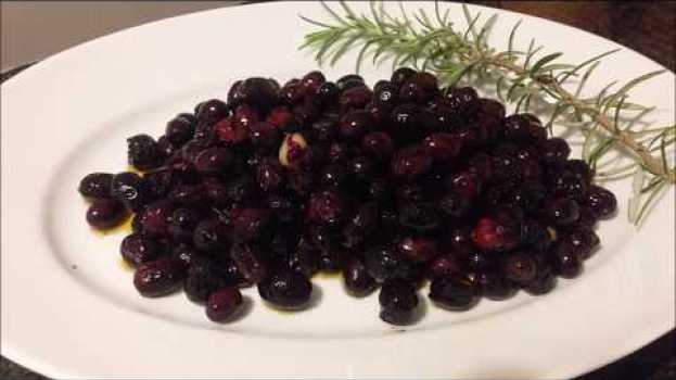 Video Olive nere con aglio e peperoncino en français